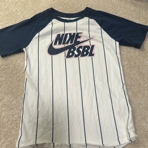 Nike baseball shirt. Used. Size small. Tiny stain in the back side.